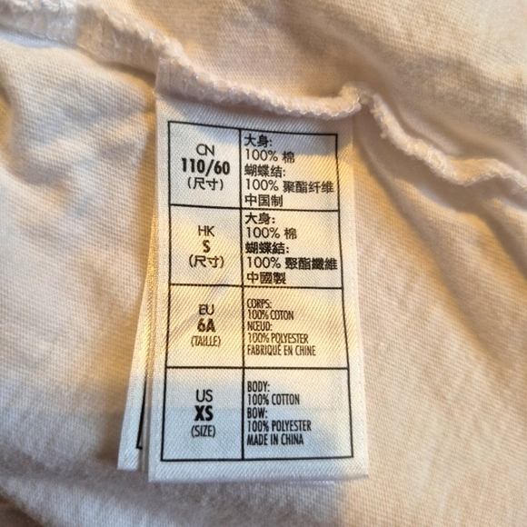 Disney Parks girls size XS or 6 white short sleeve shirt, satiny bow on back - Picture 4 of 5